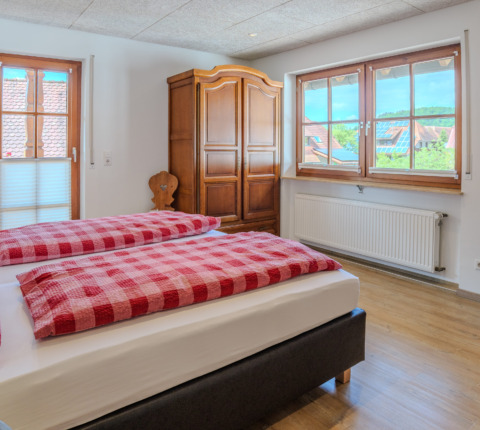 Schlafzimmer mit Balkon
